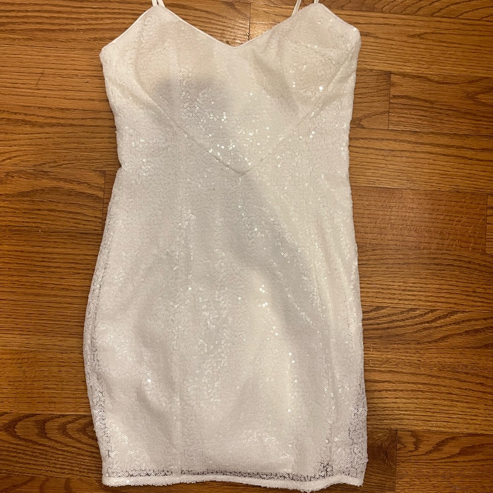 White sequin mini dress with cutouts. Size small